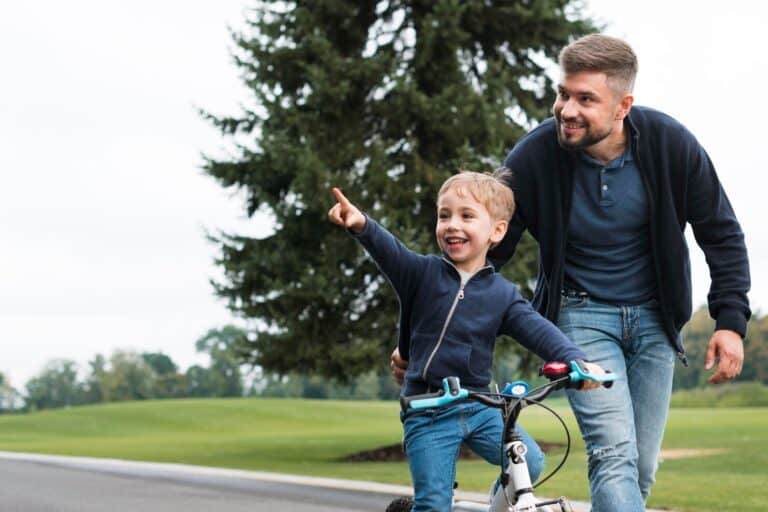 father and son playing outdoor